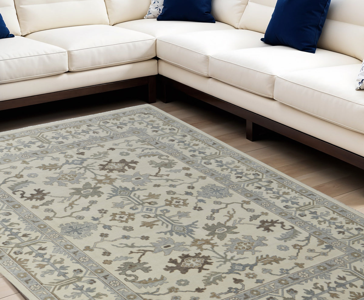 8' X 12' Ivory Gray and Brown Wool Floral Hand Knotted Area Rug With Fringe
