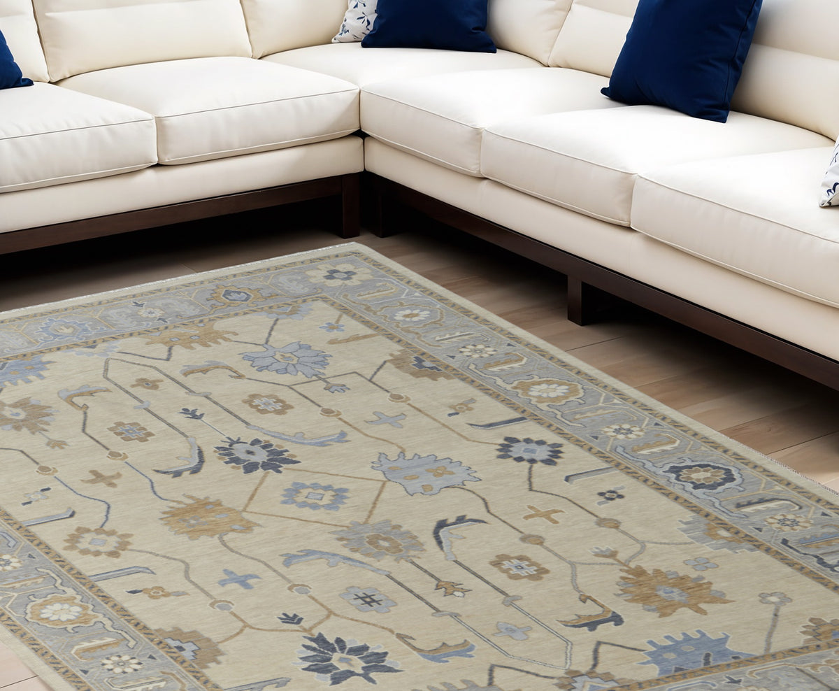 8' X 12' Gray Ivory and Blue Wool Floral Hand Knotted Area Rug With Fringe