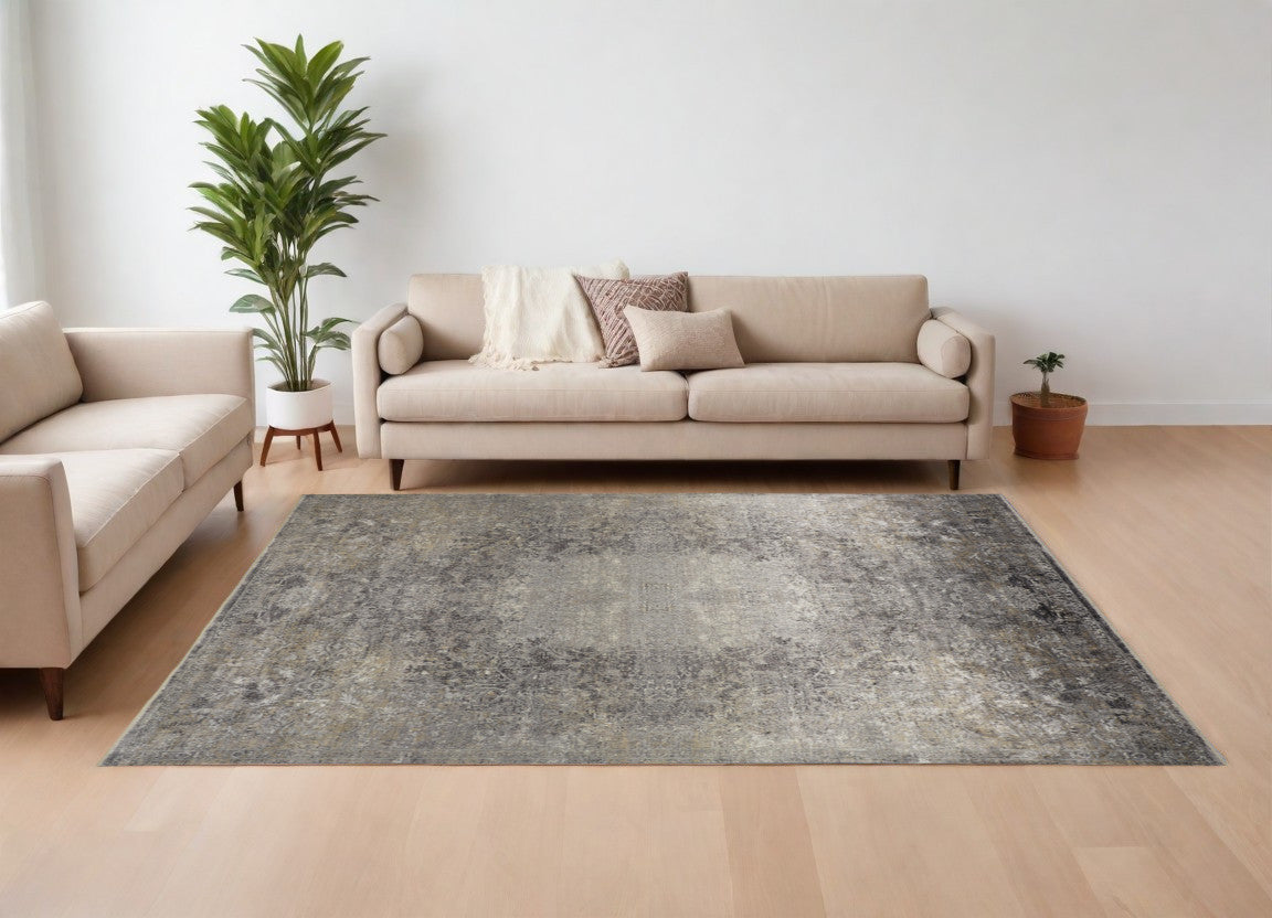 8' X 10' Tan and Gray Oriental Power Loom Worn Faded Area Rug