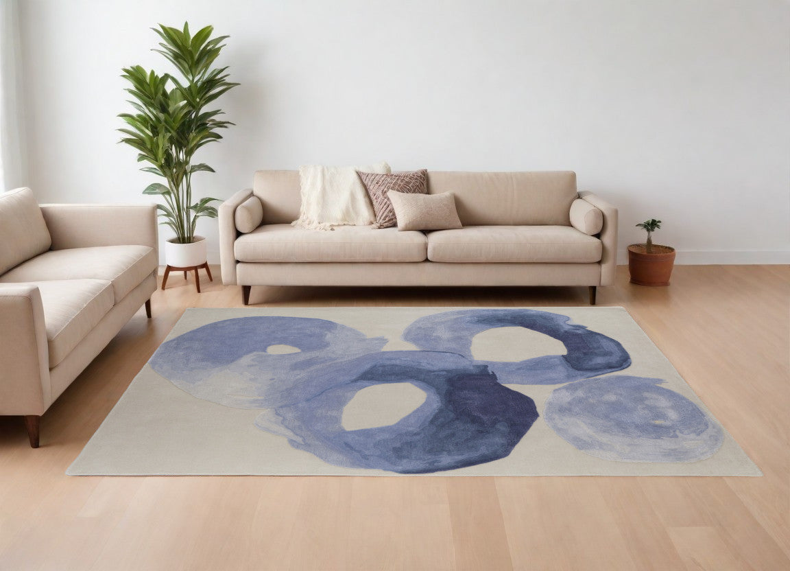 8' X 10' Blue and Ivory Abstract Hand Tufted Area Rug