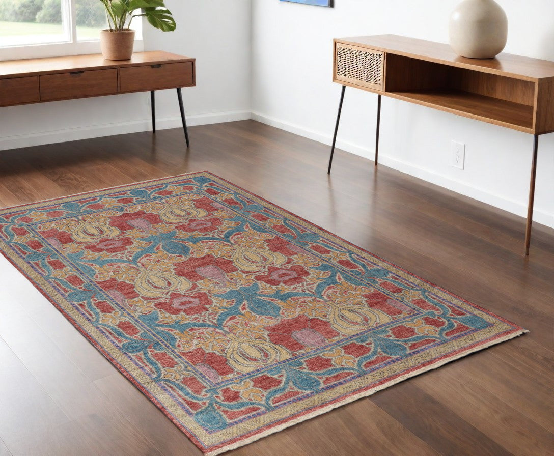 4' X 6' Blue Red and Yellow Wool Oriental Hand Knotted Area Rug