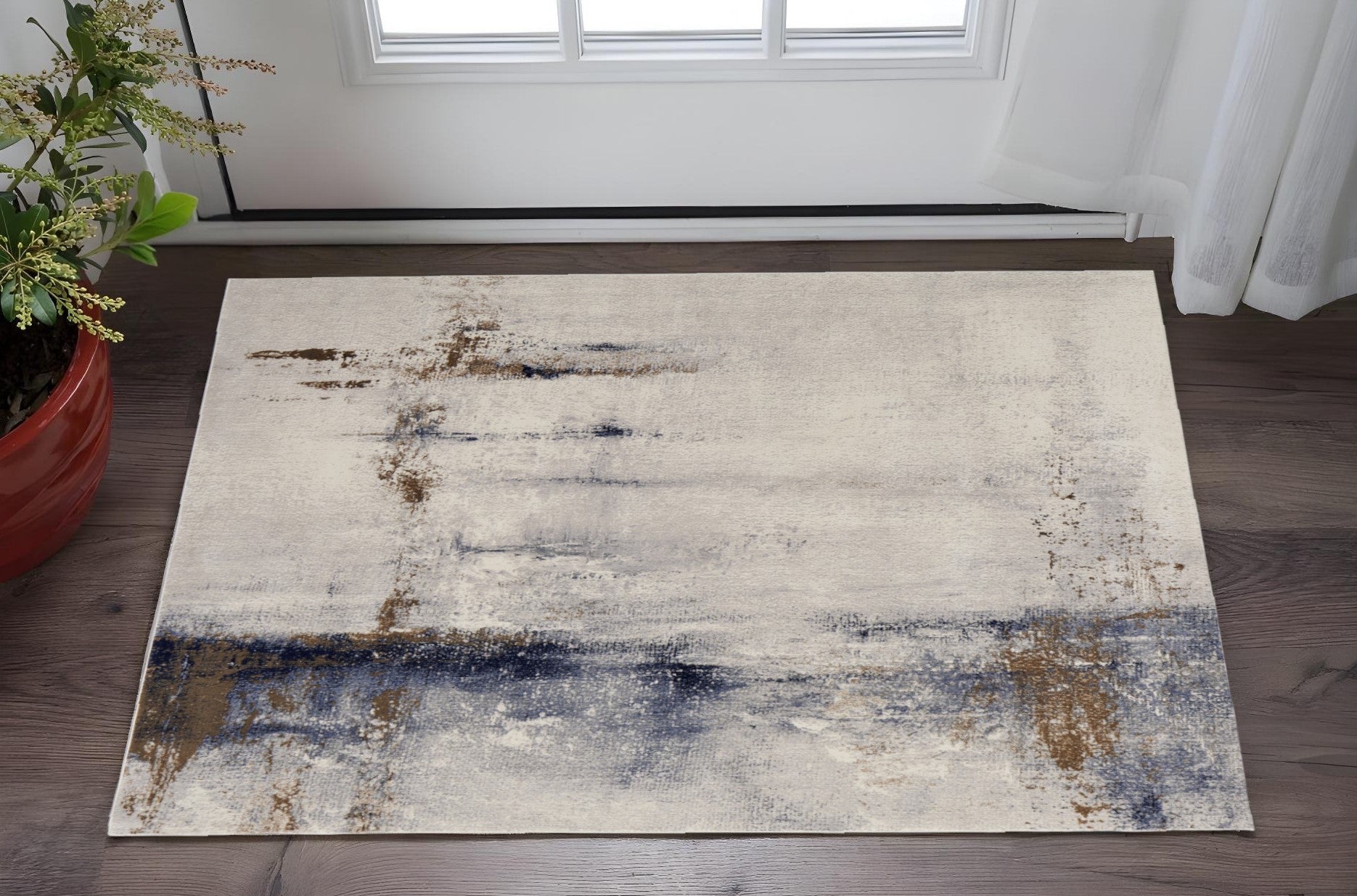 2' X 3' Ivory Blue and Brown Abstract Power Loom Area Rug