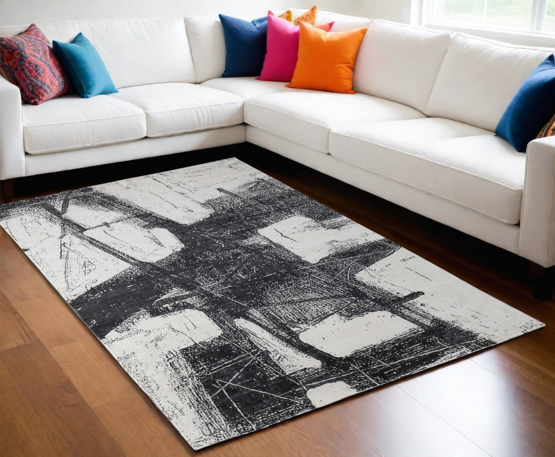 5' X 8' Black and Gray Abstract Hand Woven Area Rug