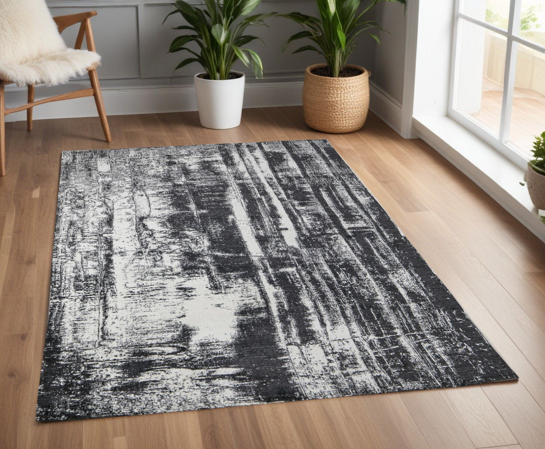 4' X 6' Black and Gray Abstract Hand Woven Area Rug