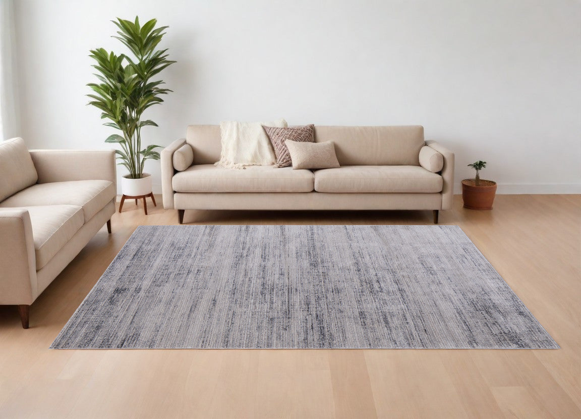 7' X 10' Gray and Ivory Power Loom Area Rug