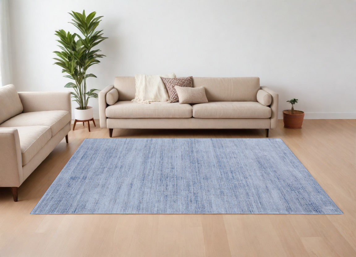 9' X 13' Blue and Ivory Power Loom Area Rug