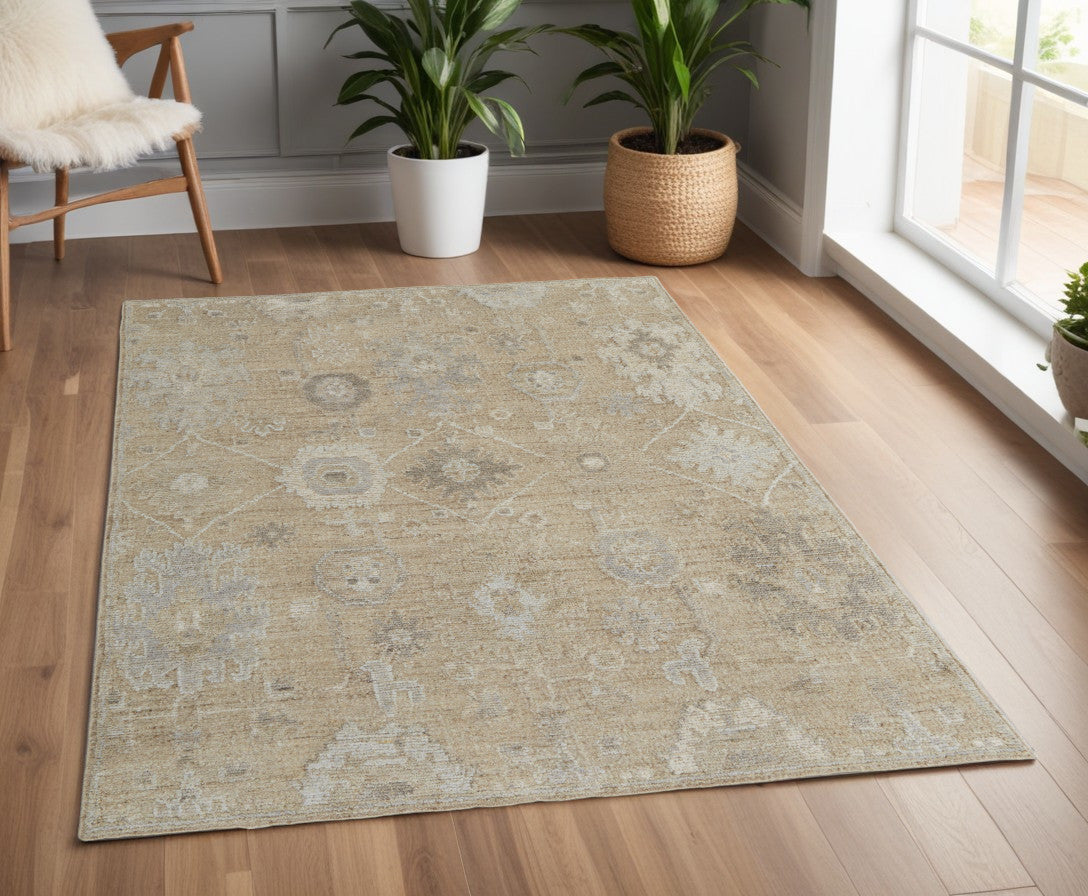 4' X 6' Tan and Ivory Wool Floral Hand Knotted Area Rug