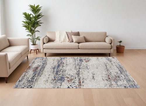 10' X 14' Gray Blue and Ivory Abstract Power Loom Area Rug