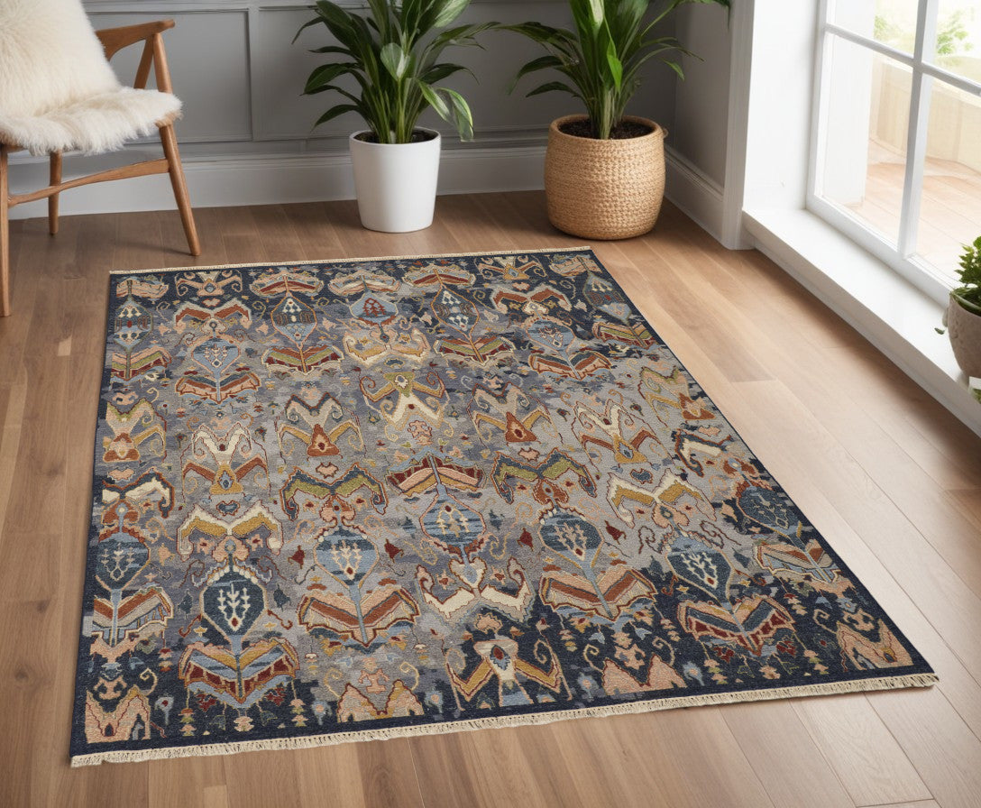 4' X 6' Blue Gray and Brown Wool Ikat Hand Knotted Area Rug With Fringe