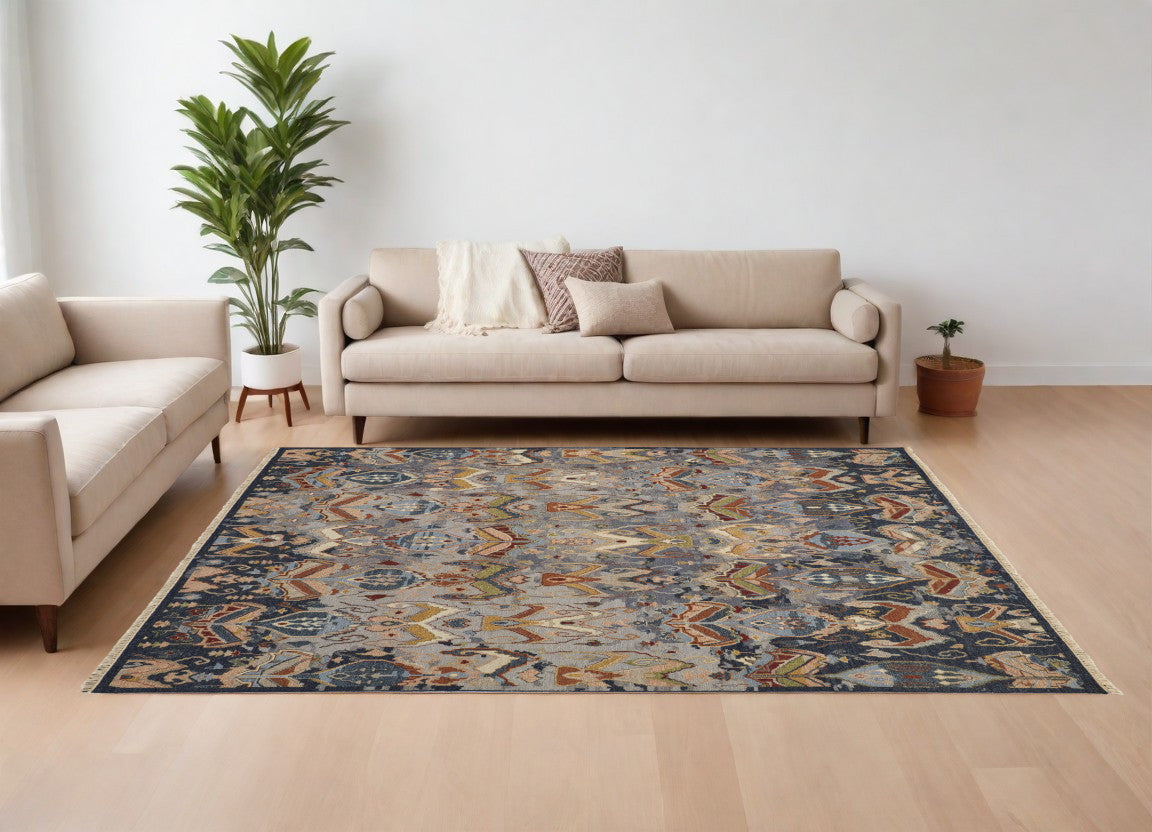 8' X 12' Blue Gray and Brown Wool Ikat Hand Knotted Area Rug With Fringe