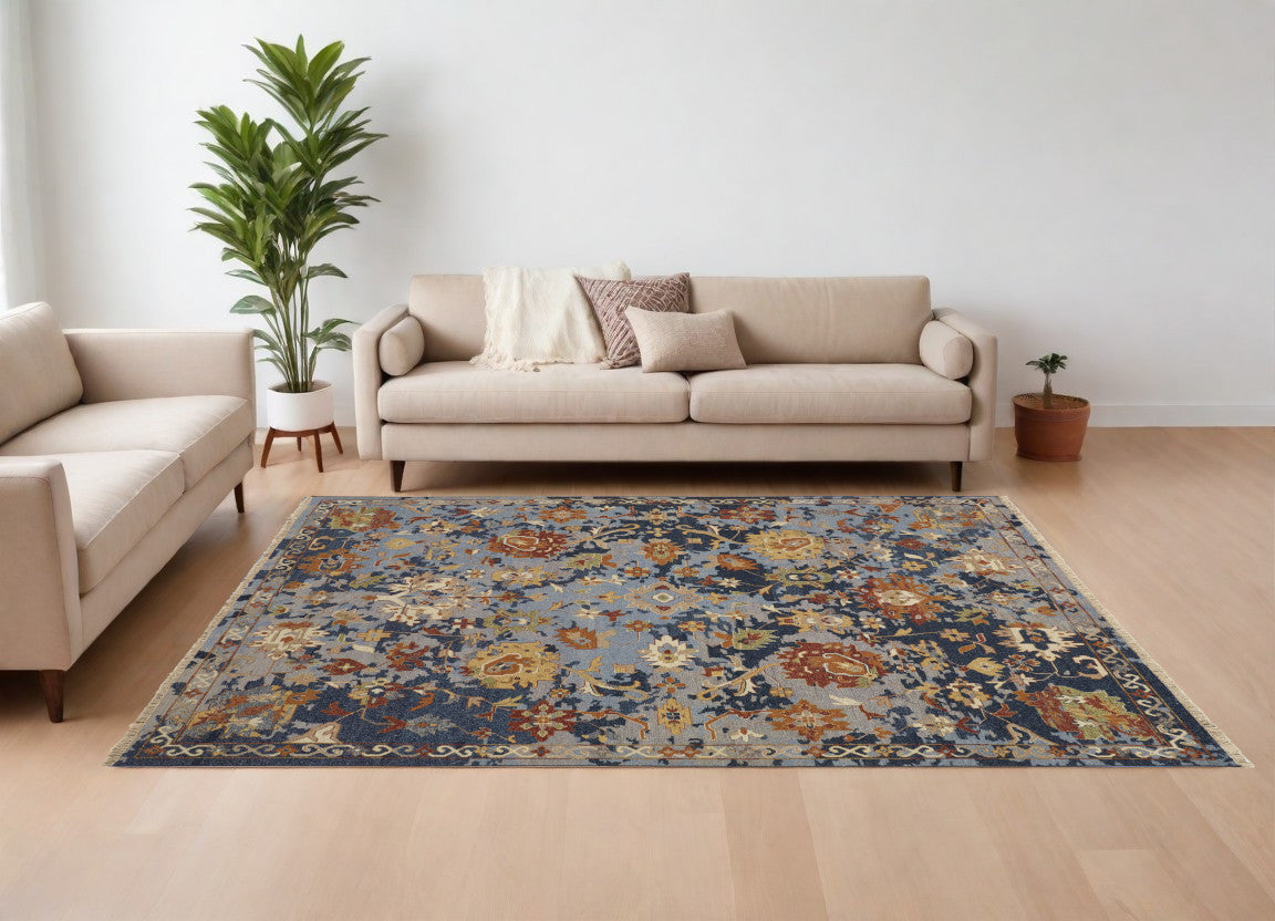 8' X 12' Blue Gray and Red Wool Floral Hand Knotted Area Rug With Fringe