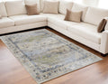 5' X 8' Ivory Green and Blue Abstract Power Loom Worn Faded Area Rug