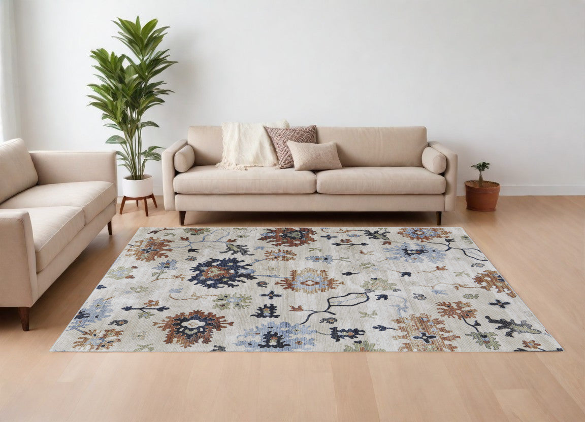 9' X 13' Ivory Red and Blue Floral Power Loom Area Rug