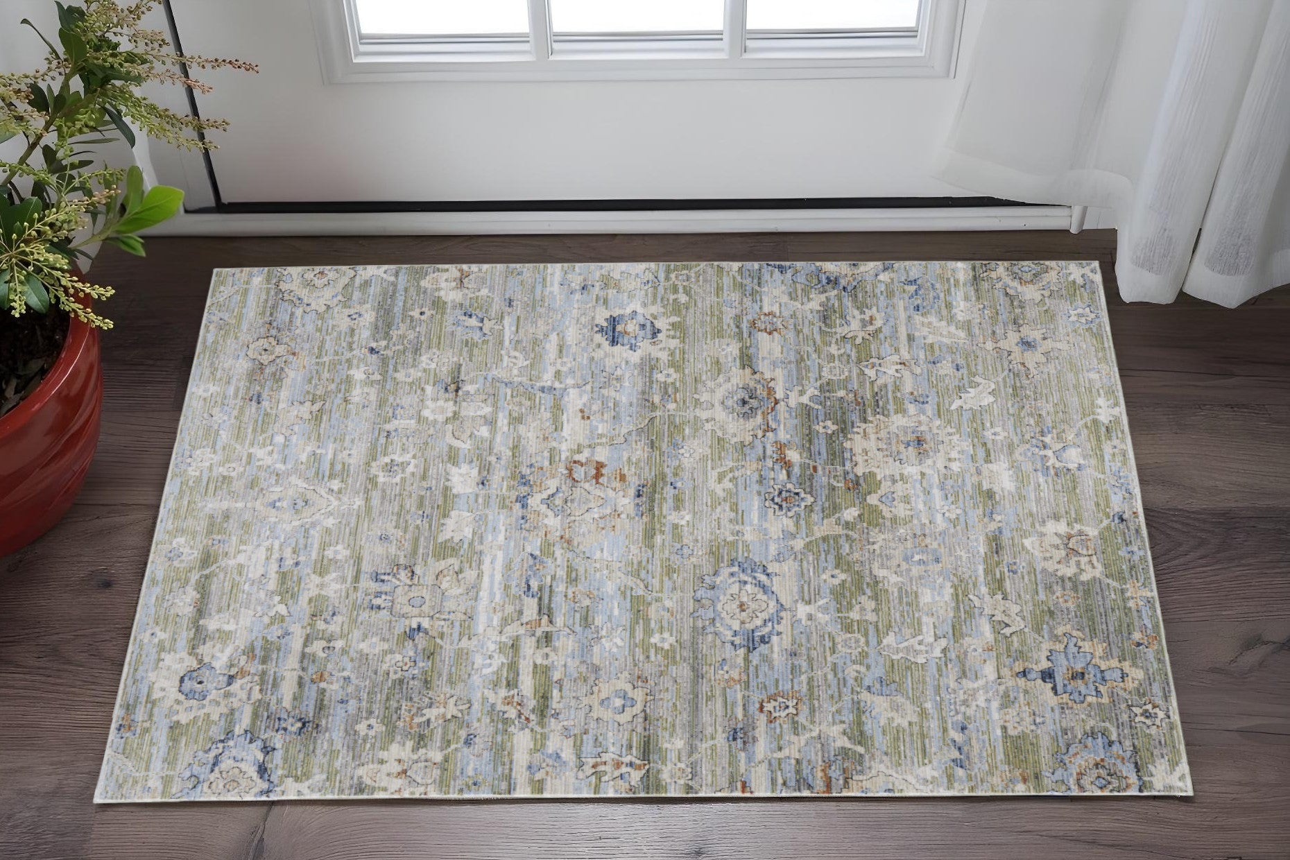 2' X 3' Ivory Green and Blue Floral Power Loom Worn Faded Area Rug