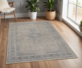 4' X 5' Gray Blue and Taupe Oriental Power Loom Worn Faded Area Rug With Fringe