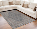 5' X 7' Gray Blue and Red Oriental Power Loom Worn Faded Area Rug With Fringe