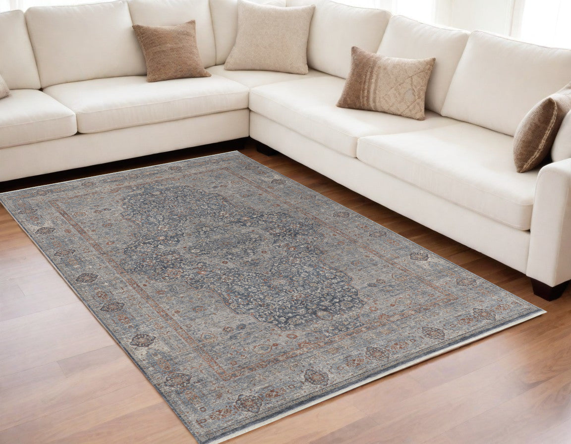 5' X 7' Gray Blue and Red Oriental Power Loom Worn Faded Area Rug With Fringe