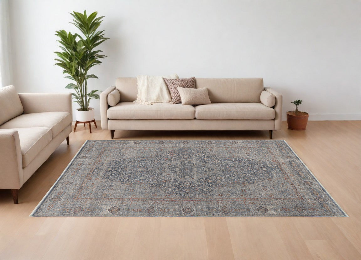9' X 13' Gray Blue and Red Oriental Power Loom Worn Faded Area Rug With Fringe
