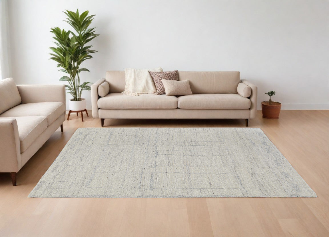 8' X 12' Gray and Ivory Abstract Hand Woven Worn Faded Area Rug