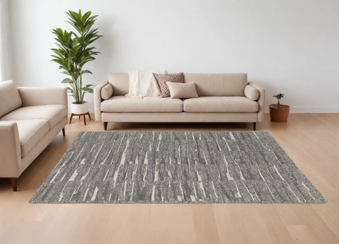 8' X 12' Gray Ivory and Taupe Abstract Hand Woven Area Rug