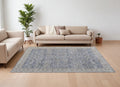 8' X 10' Taupe and Blue Ikat Power Loom Worn Faded Area Rug With Fringe