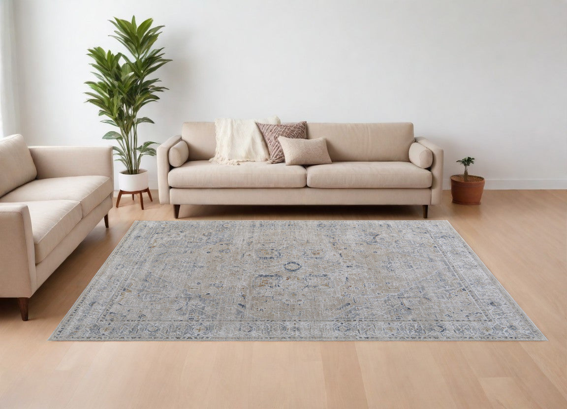 8' X 10' Ivory Taupe and Blue Oriental Power Loom Worn Faded Area Rug With Fringe