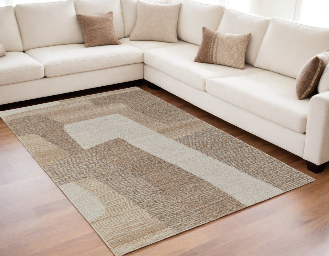 5' X 8' Brown Tan and Ivory Wool Abstract Hand Tufted Area Rug