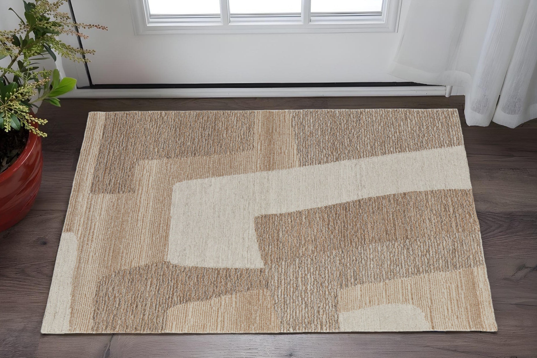 2' X 3' Brown Tan and Ivory Wool Abstract Hand Tufted Area Rug