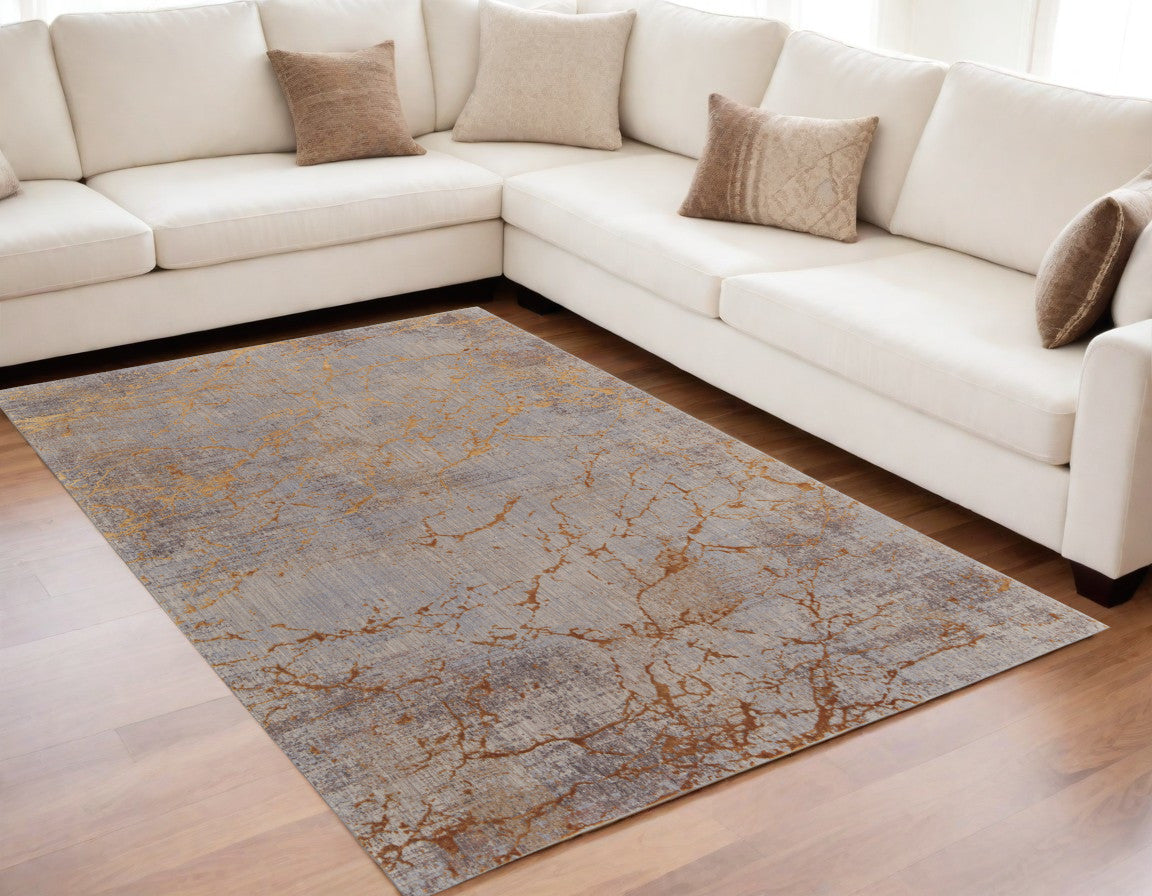 5' X 8' Brown Gold and Gray Abstract Power Loom Area Rug