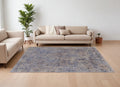7' X 10' Blue Brown and Tan Abstract Power Loom Area Rug