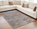 5' X 8' Ivory Brown and Taupe Abstract Power Loom Area Rug