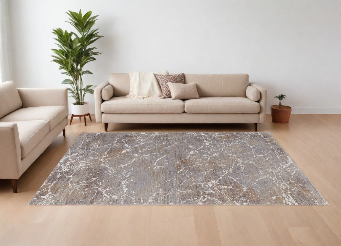 10' X 13' Ivory Brown and Taupe Abstract Power Loom Area Rug