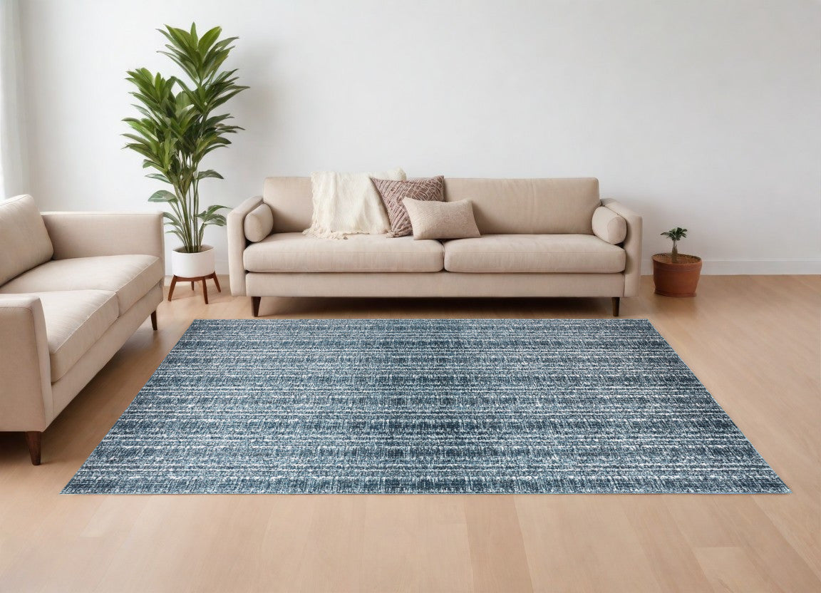 10' X 13' Blue and Ivory Power Loom Area Rug
