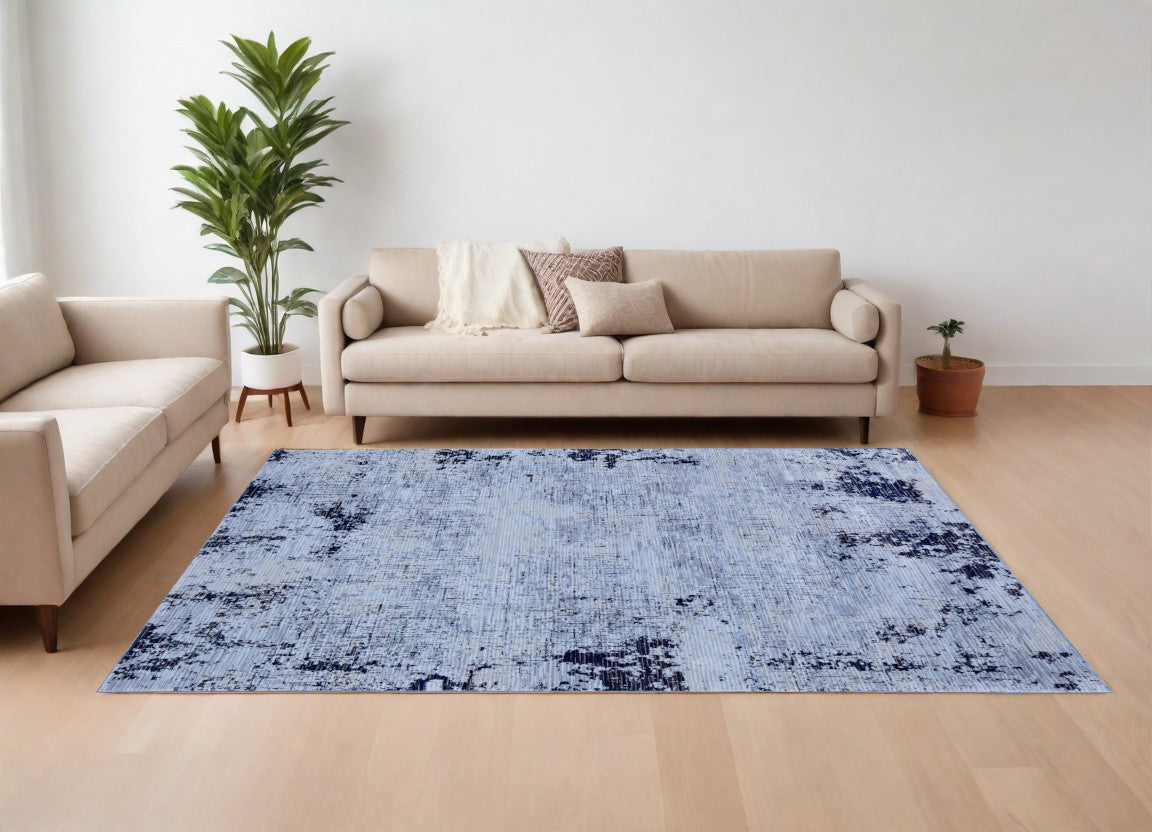 9' X 13' Light Blue and Black Abstract Power Loom Area Rug
