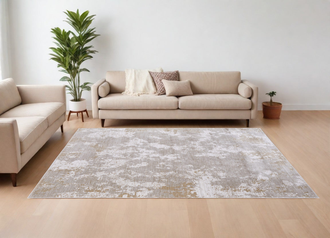 9' X 13' Gray Brown and Ivory Abstract Power Loom Area Rug