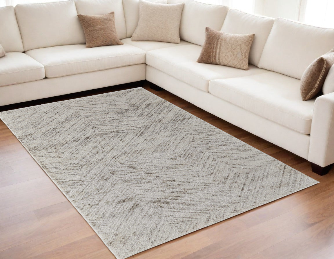 5' X 8' Ivory and Brown Geometric Power Loom Area Rug