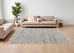 7' X 10' Ivory and Brown Geometric Power Loom Area Rug