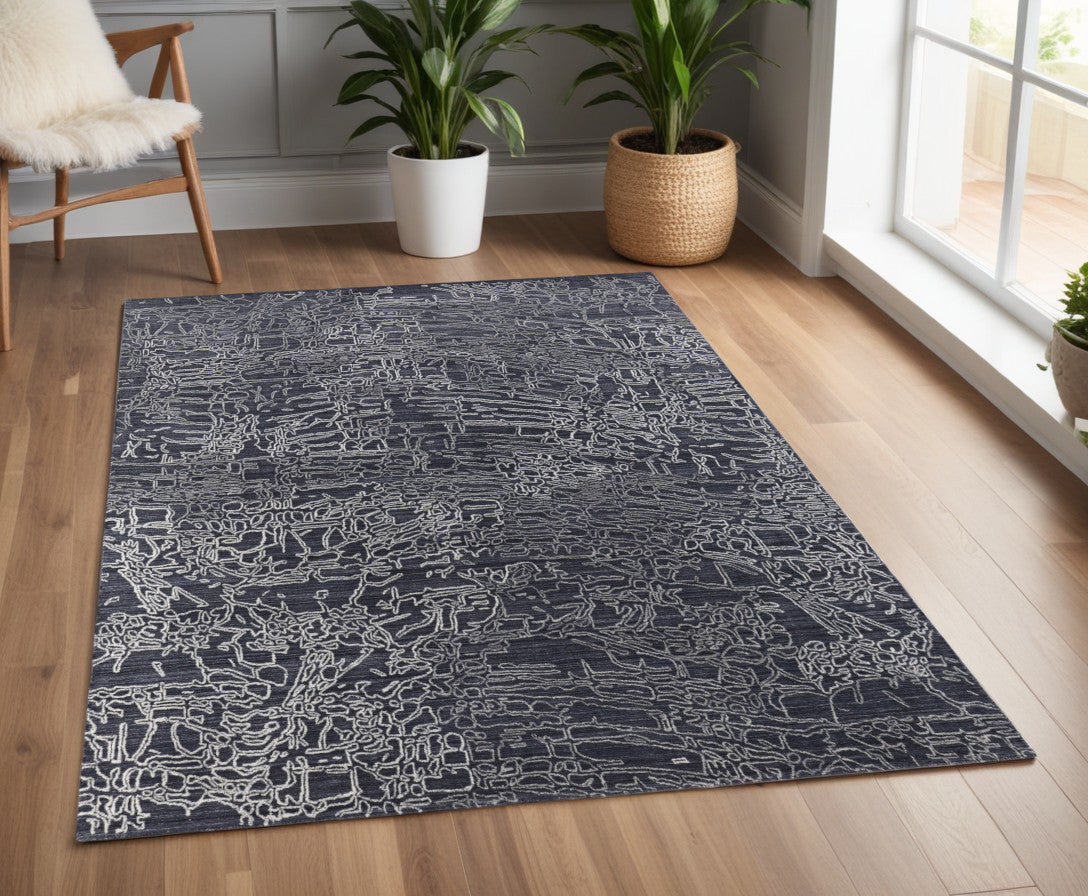 4' X 6' Black Gray and Ivory Abstract Hand Woven Area Rug