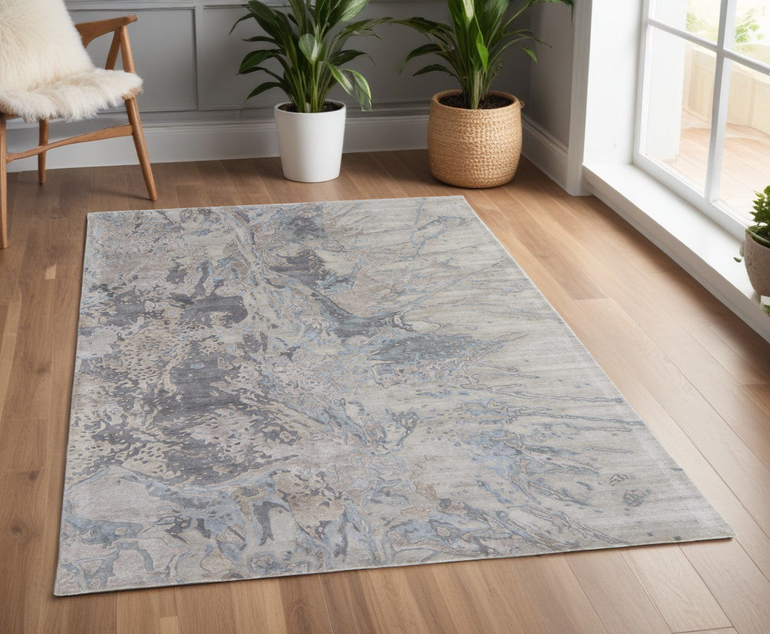 4' X 6' Gray Tan and Green Abstract Hand Tufted Worn Faded Area Rug