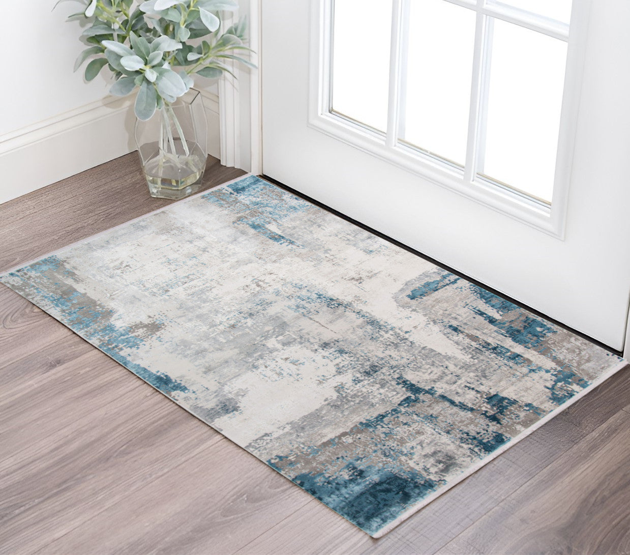 2 X 3 Gray Blue And Ivory Abstract Area Rug With Fringe