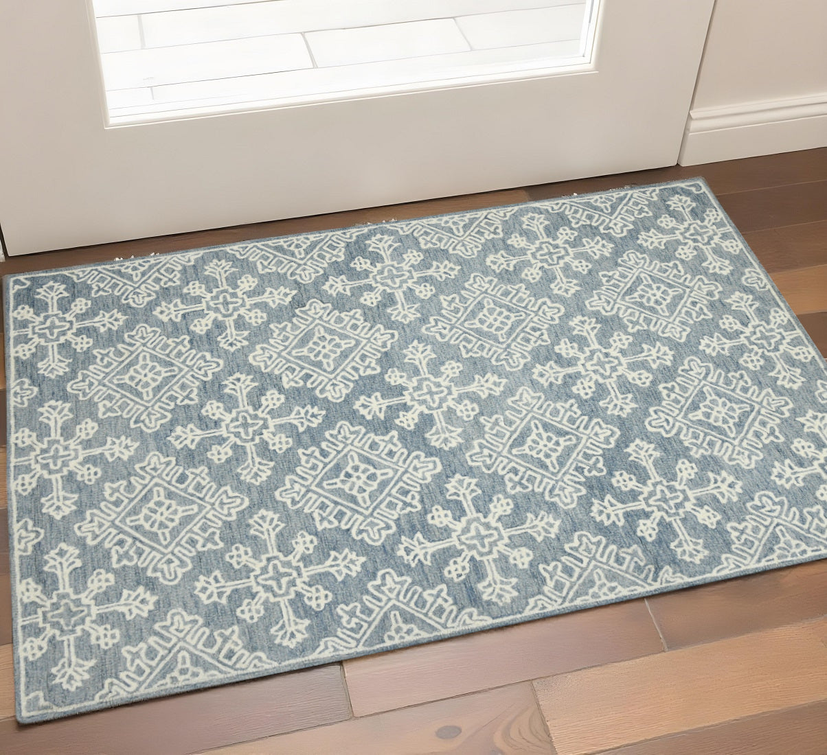 2 X 3 Sky Blue And Ivory Wool Oriental Hand Hooked Area Rug