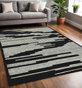 5 X 8 Black And Ivory Wool Abstract Hand Hooked Area Rug