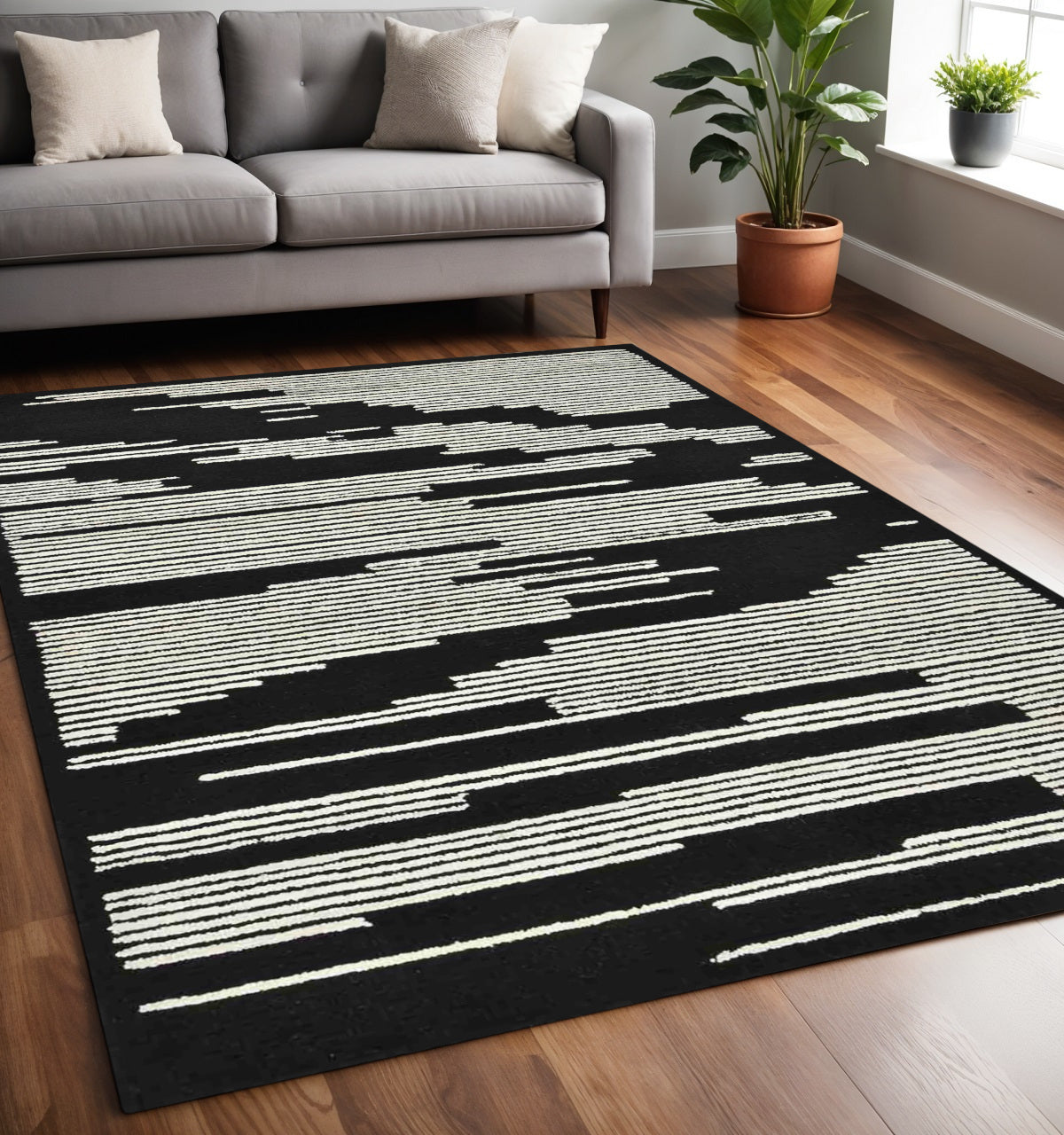 5 X 8 Black And Ivory Wool Abstract Hand Hooked Area Rug