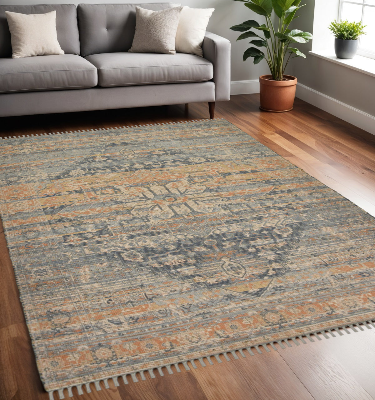 5 X 7 Orange Beige And Gray Oriental Hand Woven Area Rug With Fringe