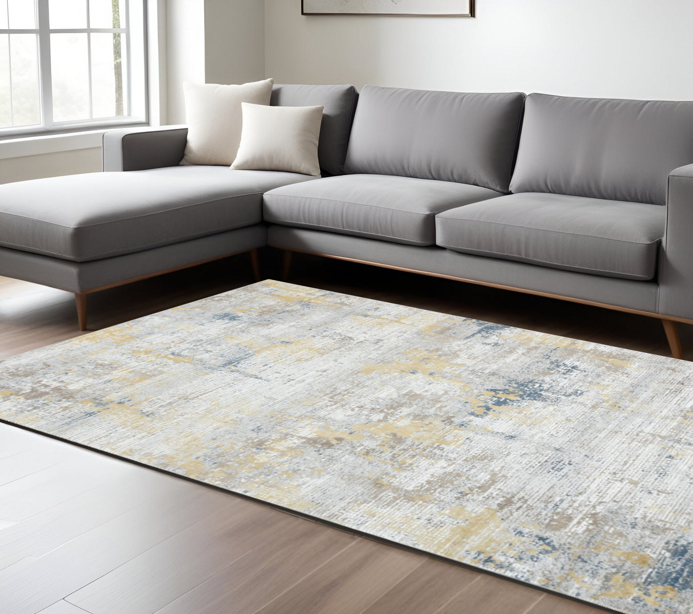 9 X 12 Gold Ivory And Blue Abstract Area Rug