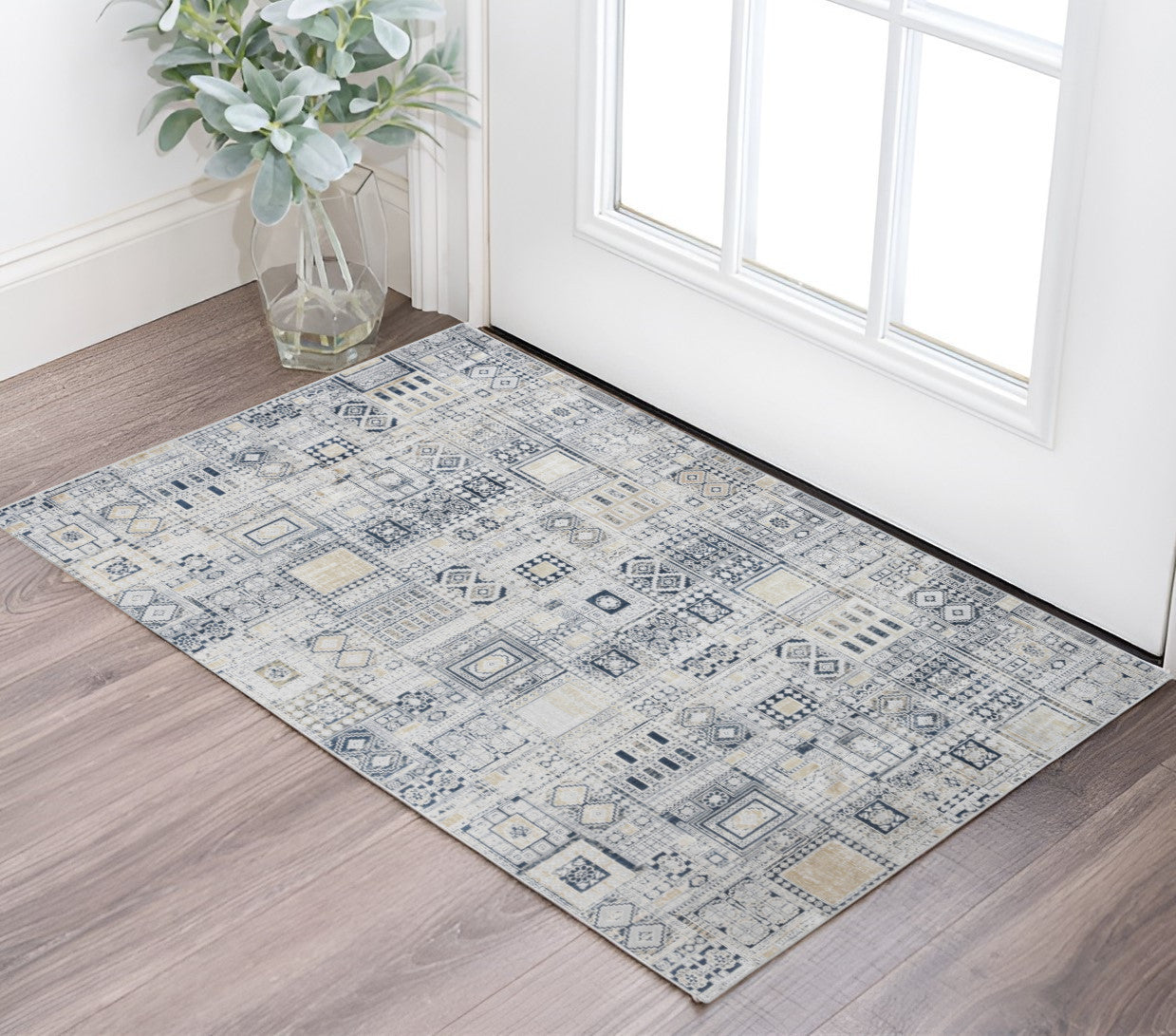 2 X 3 Ivory Black And Gold Ikat Area Rug