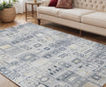 5 X 8 Ivory Black And Gold Ikat Area Rug