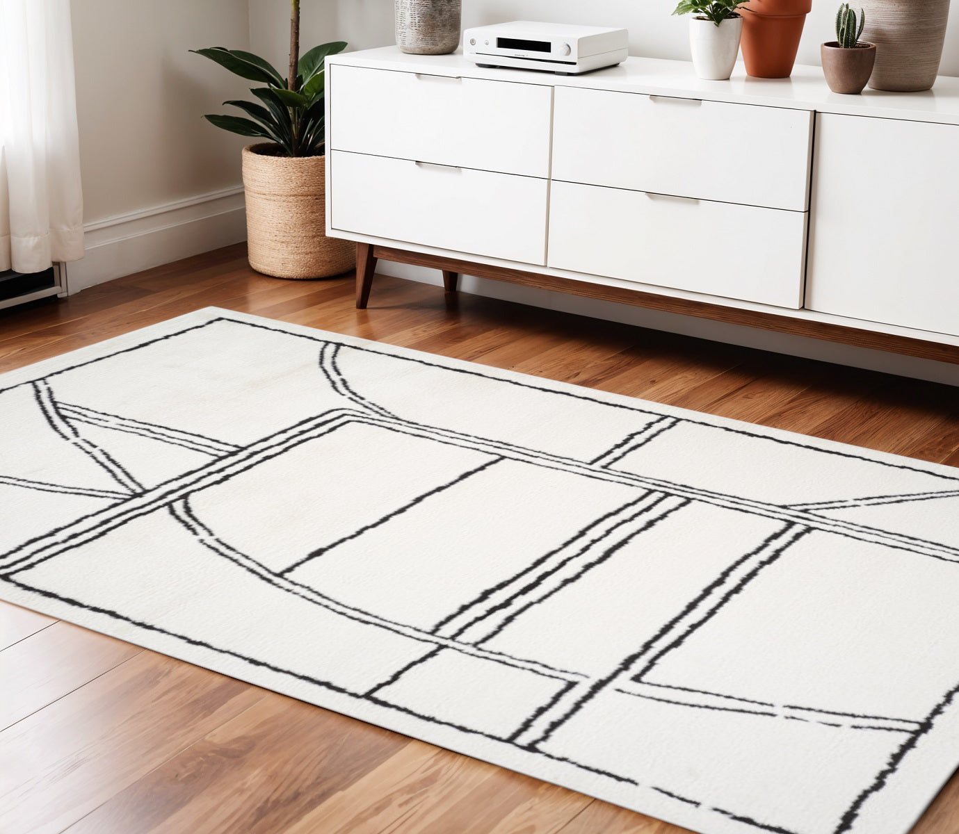 4 X 6 Ivory And Black Geometric Area Rug