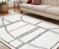 5 X 7 Ivory And Black Geometric Area Rug