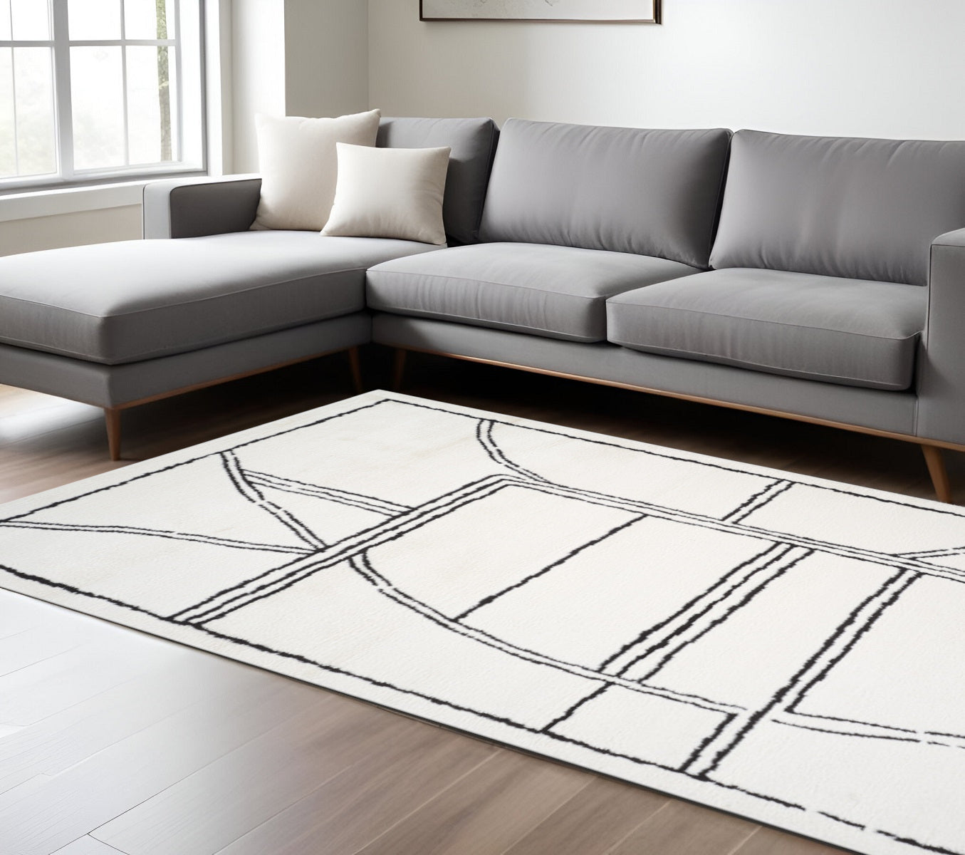 9 X 12 Ivory And Black Geometric Area Rug